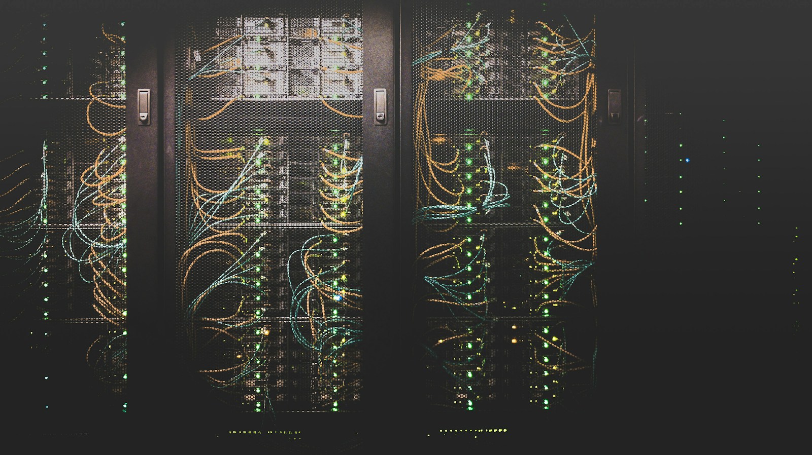 Server cabinets filled with network equipment and cabling